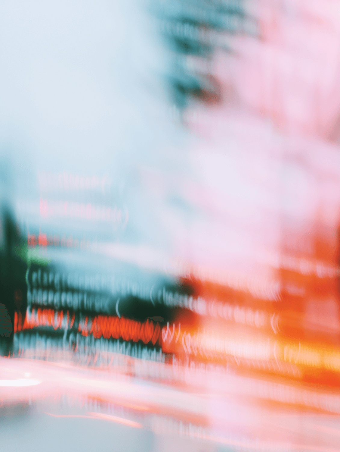 Abstract streaks of coloured light suggesting data flowing at speed